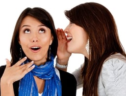 Woman telling a secret to a friend ? isolated over white-735888-edited.jpeg